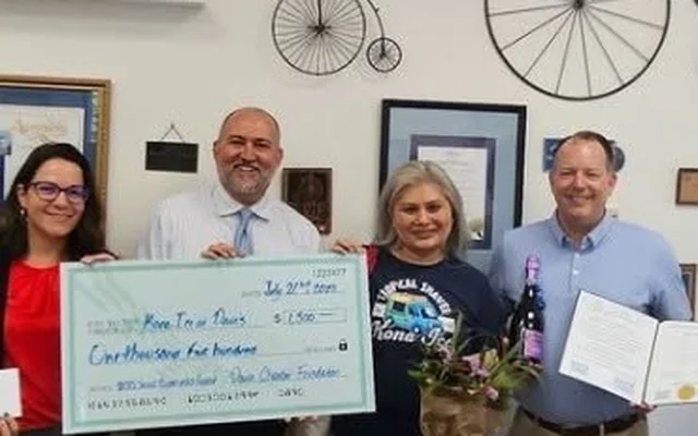 The Davis Chamber Foundation presenting a 2025 Small Business Grant to Kona Ice of Davis