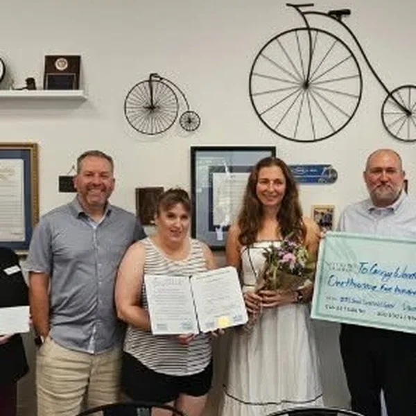 The Davis Chamber Foundation presenting a 2025 Small Business Grant to To Carry Wonder