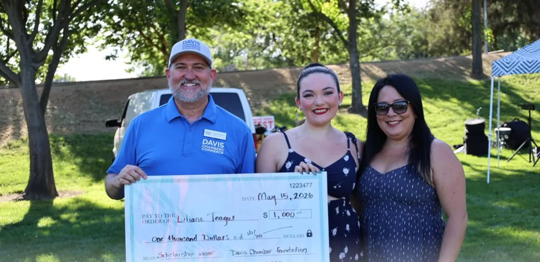 Liliana Teague receiving her Davis Chamber Foundation scholarship at Celebrate Davis